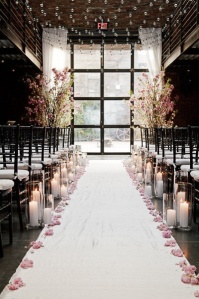 Indoor candlelight and flowers aisle style